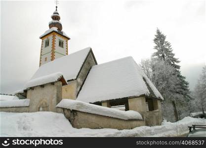 A church covered in Show, Bled, Slovenia.