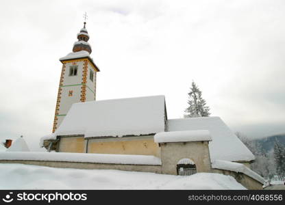 A church covered in Show, Bled, Slovenia.