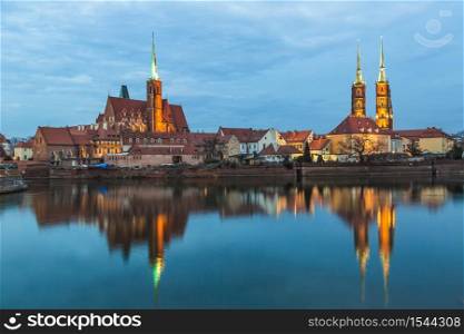 A cityscape cathedral, river Odra. Wroclaw, Poland, at dusk