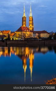 A cityscape cathedral, river Odra. Wroclaw, Poland, at dusk