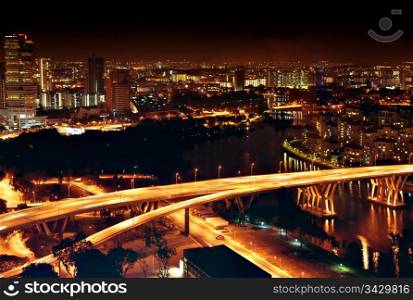 a cityscape of singapore city at night