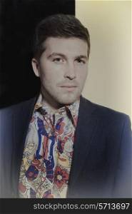 A classic portrait of a young man in a jacket