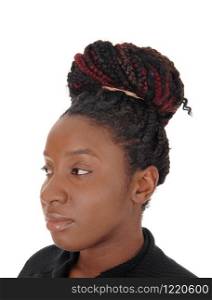 A close up image of a head shoot of an African American woman with her braided hair as a bun, isolated for white background