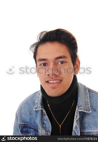 A close up image of a young good looking man in a black sweater and jeans jacket, smiling into the camera, isolated for white background