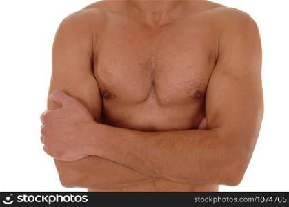 A close up image of the chest of a young handsome man with his arm scrossed, isolated for white background