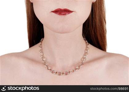 A close-up image of the mouth and shoulder of a young woman with hernecklace and red lips, isolated for white background