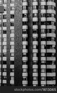 A close up of a repetitive building on black and white with copy space and cinematic ambient