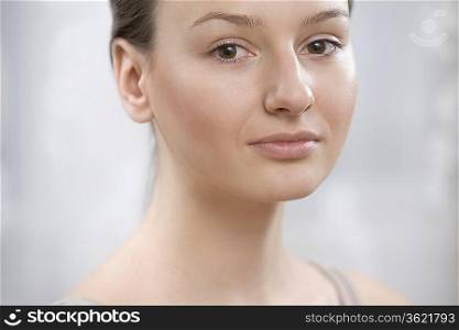 A close up of a young womans face