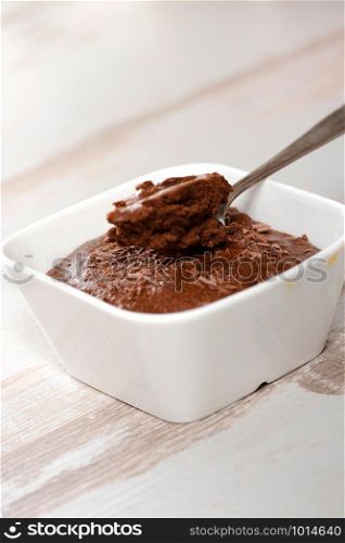 a close up of dark chocolate mousse