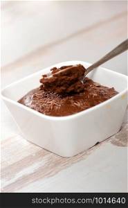 a close up of dark chocolate mousse