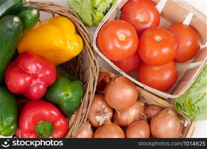 a close up of tomatoes, peppers and onions