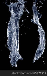 A close-up of water splash against black background.