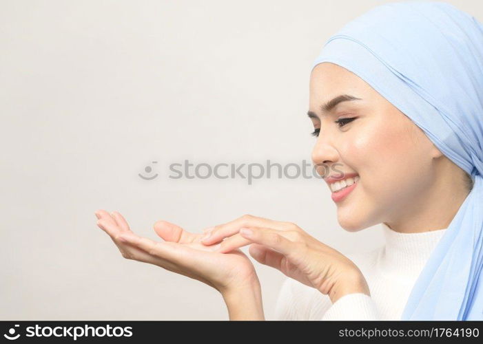 A close up of young beautiful muslim woman with hijab isolated on white background studio, muslim beauty skin care concept.. close up of young beautiful muslim woman with hijab isolated on white background studio, muslim beauty skin care concept.