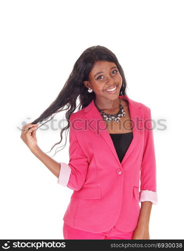 A close-up portrait image of a African American woman in a pinkjacket and necklace, smiling isolated for white background