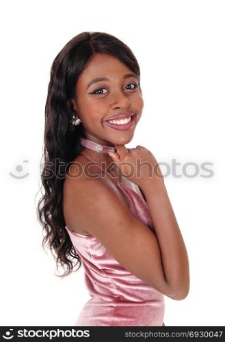 A close-up portrait of a African woman in a pink dress and long blackhair, smiling, taking from above, isolated for white background