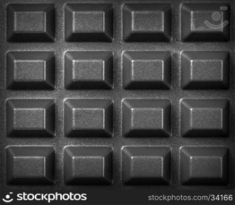 A close up shot of a waffle iron background