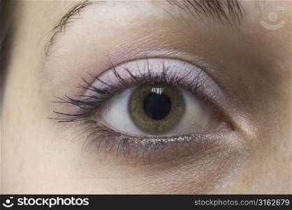 A close-up shot of an eye with make-up