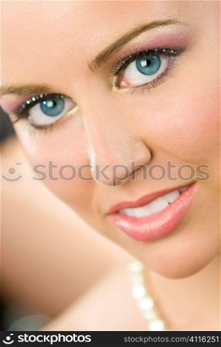 A close up studio shot of a beautful model with stunning make up