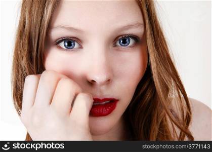A closeup face picture of a lovely teenager with blue eye&rsquo;s and long blondhair, isolated for white background.