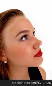 A closeup picture of a beautiful young woman with her red lips, lookingup, isolated for white background.