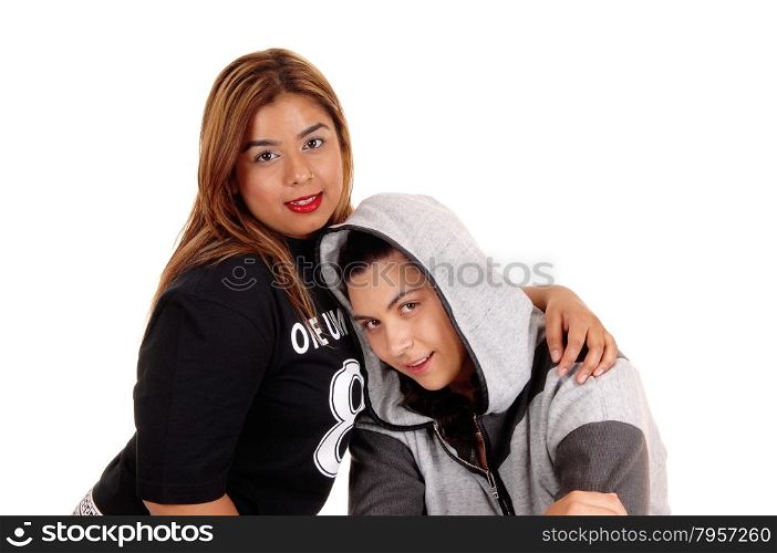 A closeup picture of a Caucasian and a East Indian woman, one in a hoodyhugging, isolated foe white background.