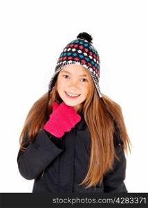 A closeup picture of a young girl with long blond hair, a hat and mittens,standing isolated for white background.