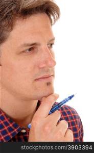 A closeup picture of a young man, holding a blue pen, in deep thoughts,isolated for white background.