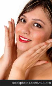A closeup picture of the face of a very happy young woman with her handsclose to her face, isolated for white background.