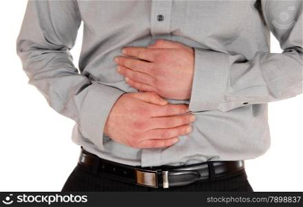 A closeup picture of the stomach of a young man holding his hands onthe stomach for heavy pain, isolated for white background.
