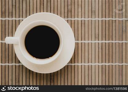 A closeup shot of a cup of coffee on the table