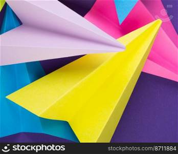 A closeup shot of colorful handmade paper planes. Closeup shot of colorful handmade paper planes
