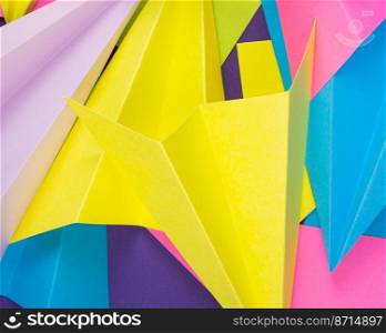 A closeup shot of colorful handmade paper planes. Closeup shot of colorful handmade paper planes