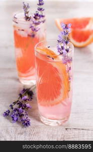 A cocktail of grapefruit and lavender paired with tequila, full of bright citrus aromas and fragrant herbs, showcasing the best fruits of the season.