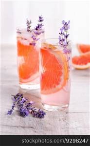 A cocktail of grapefruit and lavender paired with tequila, full of bright citrus aromas and fragrant herbs, showcasing the best fruits of the season.