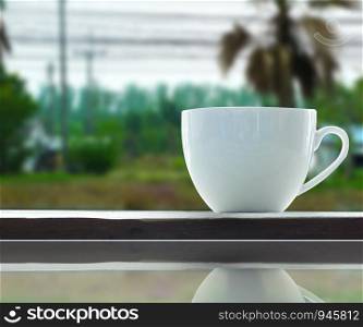 A coffee espresso on wood table nature background