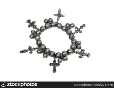 A collection of a antique silver crosses arranged in a continuous circle - path included