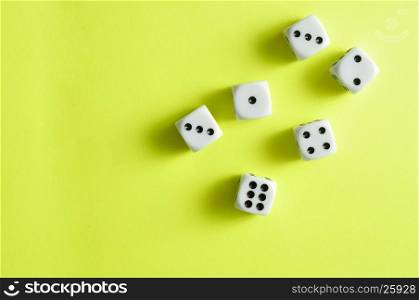 A collection of dices that has been rolled and landed on different numbers