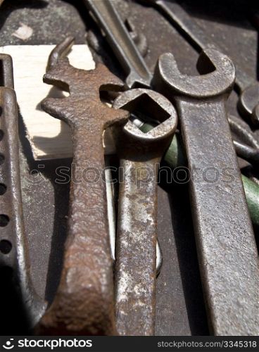 a collection of old rusty tools
