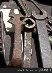 a collection of old rusty tools