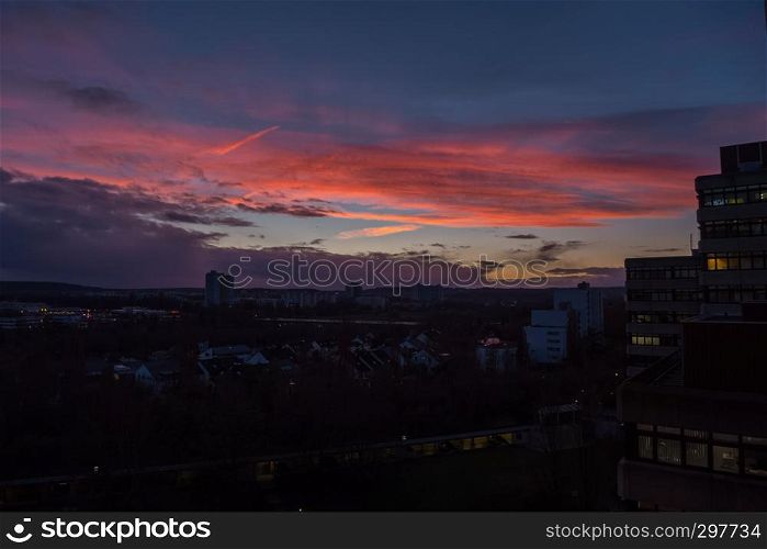 A colorful sundown above a city in Germany