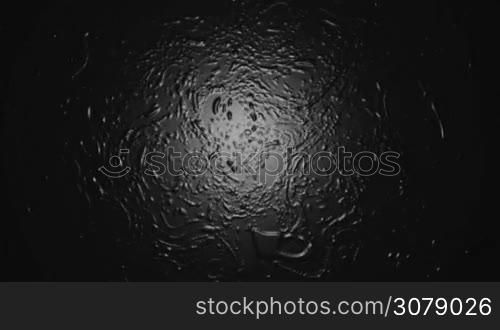 a computer generated abstract background with a stylizied molten fluid viscous liquid effects