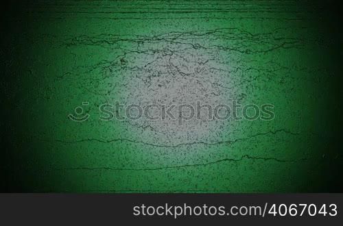 A computer generated animation of a black wall with scratches and indents together with flashing and flickering coloured lights