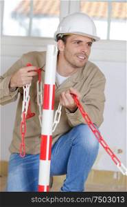 a concentrated male builder indoors