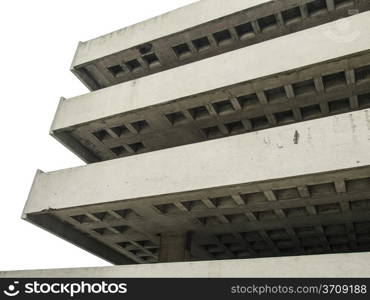 A concrete parking structure with three floors. (Isolated to a white background.)