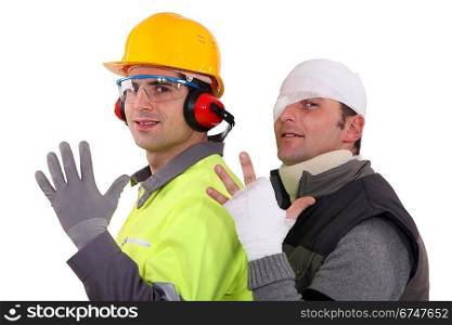 A construction worker and his injured colleague.