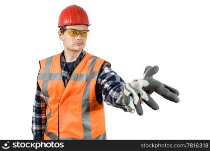 A construction worker, handing over a pair of gloves