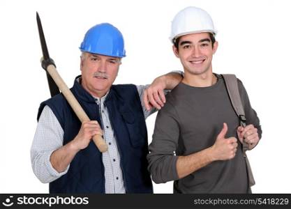 A construction worker teaching his job.