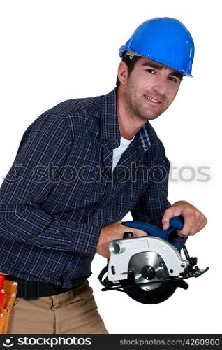A construction worker with a circular saw.