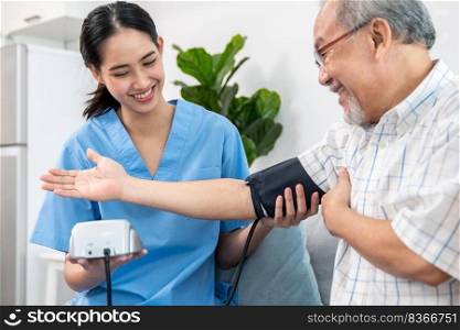 A contented retired man having a blood pressure check by his personal caregiver at his home with a smiley face. Senior care at home, nursing home for pensioners.. A contented retired man having a blood pressure check by his personal caregiver.