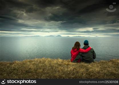 A couple contemplating the beautiful landscape